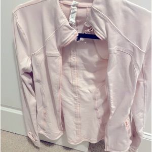 Size 6 light pink Lululemon jacket worn only twice
